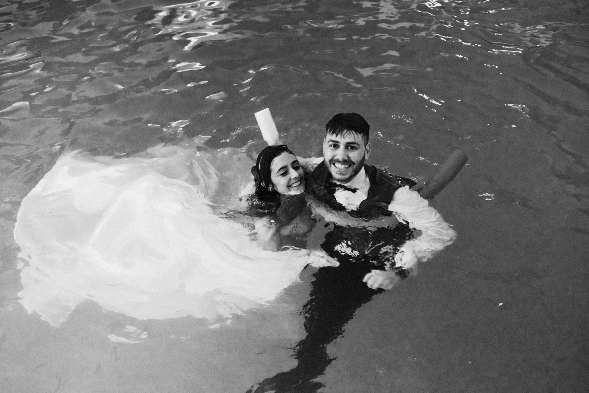 brides-swiminpool-water-happy-fun-wedding-Galice